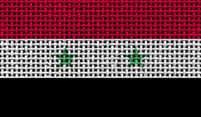 Syria flag on the surface of a metal lattice. 3D image