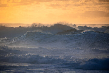 Misty Sunset over Waves on North Shore of Oahu