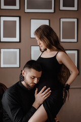 Female mother and with her husband together in anticipation baby