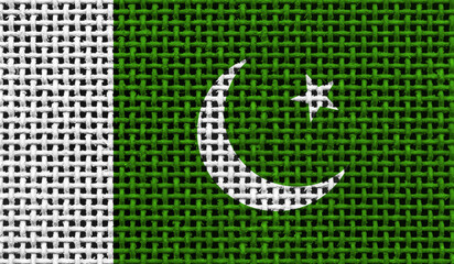 Pakistan flag on the surface of a metal lattice. 3D image