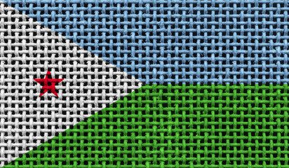 Djibouti flag on the surface of a metal lattice. 3D image