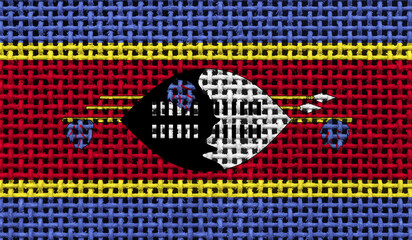 Swaziland flag on the surface of a metal lattice. 3D image