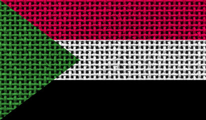 Sudan flag on the surface of a metal lattice. 3D image