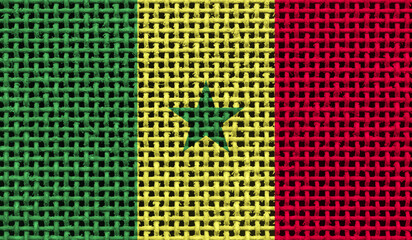 Senegal flag on the surface of a metal lattice. 3D image