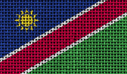 Namibia flag on the surface of a metal lattice. 3D image