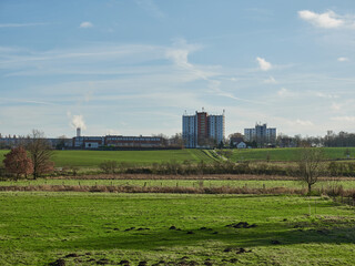 Landscape shot with large buildings in the background