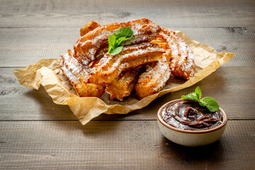 Spanish churros waffles with chocolate and sugar