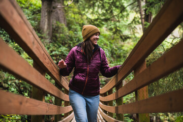 Solo Female Traveler Exploring nature trails in Oregon