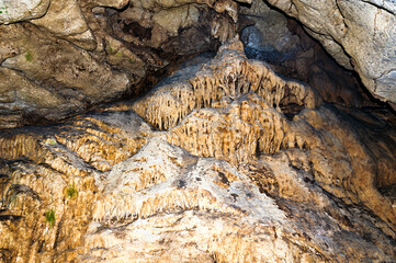 Stalactite, stalagmite walls of the cave. Template for design.