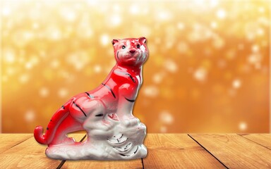 Chinese New Year of tiger 2022 on a wood table in the morning