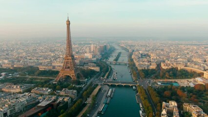 Aerial view of Paris Cityscape with Eiffel Tower as main Landmark Monument and Cultural Icon of Capital of France. Popular Touristic Destination. Travel and Urban Skyline B-roll. 4K drone zoom in shot - Powered by Adobe