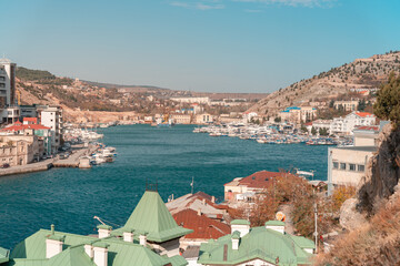 Overlook of Balaklava Bay with houses and hotels on the shores