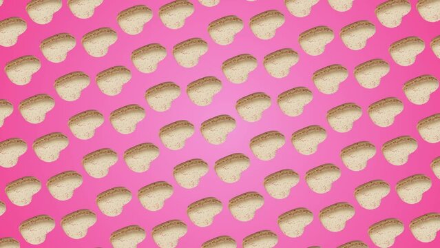 Professional motion design 4K animated pattern with many heart-shaped Sweet vanilla color macaroons move and rotates on trending pink color gradient backgroundnd, top view. 3 in 1 different sides and 