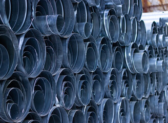 Obraz premium metal ventilation pipes of different sizes stacked 