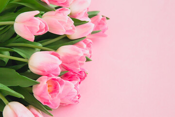 Beautiful bouquet of pink tulips. Soft focus. Greeting card for Women's Day.	