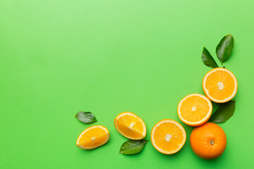 fresh Fruit orange slices on colored background. Top view. Copy Space. creative summer concept. Half of citrus in minimal flat lay with copy space