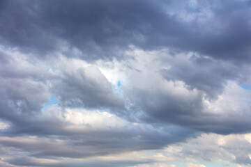 Cloud on blue sky background. Fluffy cumulus white and grey color cloudscape