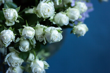 Bouquet of flowers on a blue background