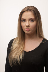 Portrait of sad young woman emotional alone in white background