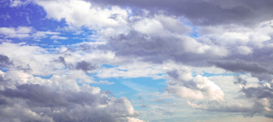 Cloud on blue sky background. Fluffy cumulus white and grey color cloudscape