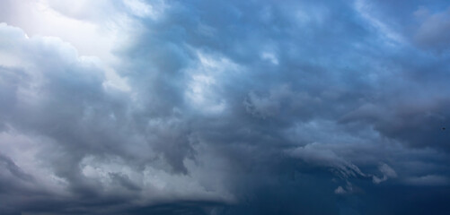 Cloud on blue sky background. White and grey color cloudscape, gloomy weather