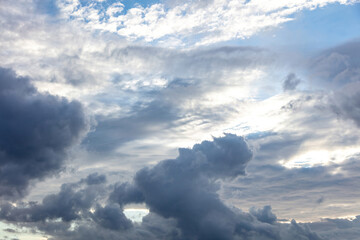 Cloud on blue sky background. White and grey color cloudscape, gloomy weather