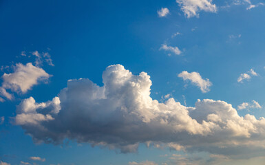 Cloud on blue sky background. Cloudscape grey and orange shade. Twilight light color the cloudy sky