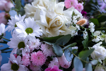 Bouquet of flowers on a blue background
