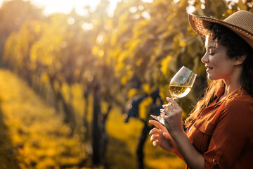 Beautiful woman enjoying in wine - Powered by Adobe
