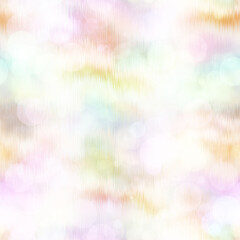 Seamless pale pastel tie dye bokeh texture. Soft tone on tone summer repeat background with washed out sun bleached ink dyed effect. 