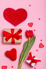 alentine's Day concept with gift boxes, flower and hearts on pink background. Flat lay.
