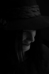 Silhouette of a person in a hat