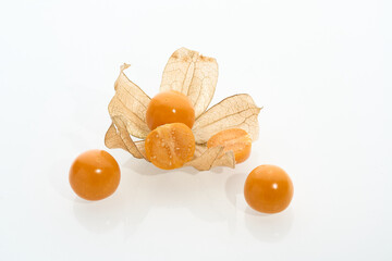 Ripe physalis berry isolated on white background. Close-up macro