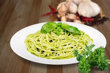 Classic italian pasta pesto with pound garlic, basil leaves, hard parmesan cheese