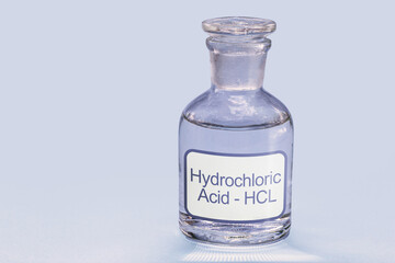 bottle of hydrochloric acid, a chemical solution used in cleaning and galvanizing metals, in...