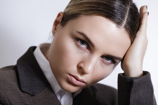 Fashionable Studio Portrait Of Young Masculine Woman