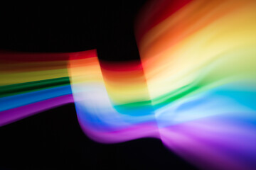 Colored blurred light lines. Abstraction of light. 
Lgbt flag.
