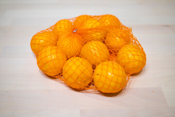 tangerines in a grid on the table. Food poisoning, allergy to citrus fruits, vitamins, immunity