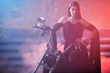 Fototapeta na wymiar glamorous lady with motorcycle