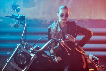 Fototapeta na wymiar biker girl in stylish glasses