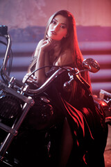 Obraz na płótnie Canvas beautiful lady on motorbike