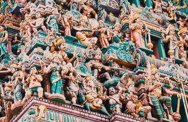 SINGAPORE, SINGAPORE - MARCH 2019: Intricate Hindu art and deity carvings on the facade of Sri Veeramakaliamman Temple in Little India, Singapore.