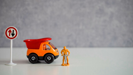 a road worker or a worker with a jackhammer in various situations on the road, dolls 