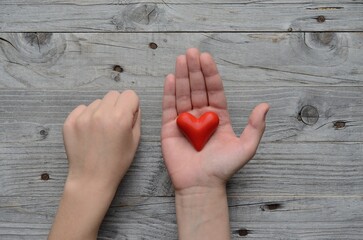 Заголовок: Valentine's day , 14 february .Declaration of love . valentine , two hearts . Valentines in the shape of a heart in hand .