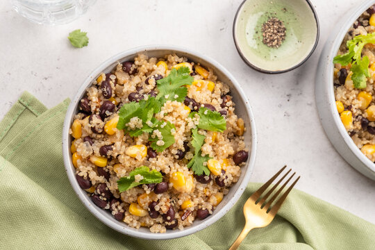 Vegan meal of quinoa with corn and black beans. Healthy organic vegan food