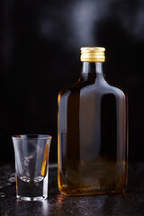 flat,glass brandy bottle