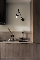 Simple kitchen with wooden furniture