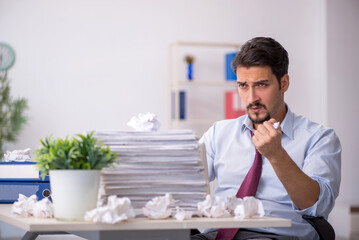 Young male employee in rejected ideas concept