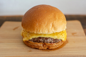 Classic cheeseburger with bread, patty and cheese.