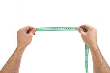 holding measuring tape in hands on a white background